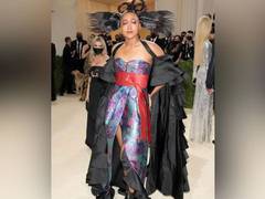
    Naomi Osaka arrives at Met Gala in glamorous outfit co-designed by her sister
    