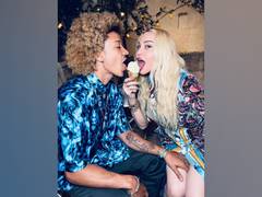 
      
      Madonna packs on some PDA with boyfriend Ahlamalik Williams...
      
      