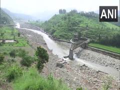 
      
      J-K: Heavy rain, flash floods damage foot over bridge in Rajouri
      
      