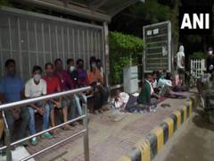 
      
      People in Gurugram queue up outside COVID vaccination camp...
      
      