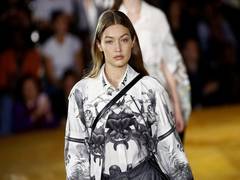 
      
      Gigi Hadid confronts crasher at Chanel Fashion Show, escorts...
      
      