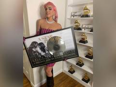 
      
      Lady Gaga celebrates 'A Star Is Born' milestone with pink hair
      
      