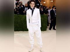 
    Timothee Chalamet makes his Met Gala debut in an all-white outfit and sneakers
    