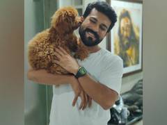 
      
      Pet parent Ram Charan returns home to Rhyme amid 'RRR' promotions
      
      