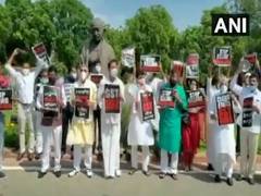 
      
      Opposition MPs protest at Parliament premises demanding GST...
      
      