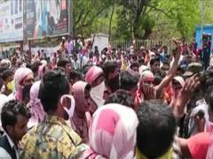 
      
      Migrant labourers protest in Andhra's Guntur, demand govt...
      
      