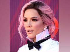 
      
      Halsey flaunts her growing baby bump as she gets ready to...
      
      