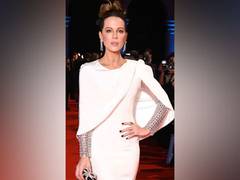 
      
      Kate Beckinsale pays emotional tribute to her late father 
      
      