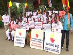 
      
      K'taka:  Cong supporters protest against Amit Shah's call to...
      
      