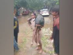 
      
      Chennai inspector carries unconscious man on her shoulder for...
      
      