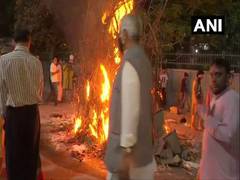 
      
      People across India perform 'Holika Dahan' amid COVID-19...
      
      