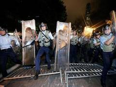 
      
      Violence erupts during Hong Kong protest against China...
      
      