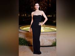 
      
      Man Carrying gun outside Alexandra Daddario's Hollywood home...
      
      