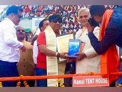 
      
      Kulldeep Sandhu honoured for song on Yogi Adityanath
      
      