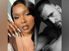 
      
      Chris Evans reacts to Lizzo's joke about expecting a baby...
      
      