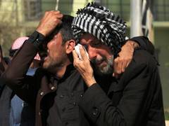 
      
      Death toll mounts to 102 in Iraq ferry disaster
      
      