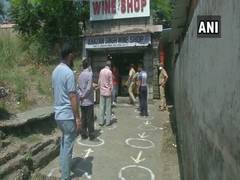 
      
      People queue outside liquor shop in Jammu, adhere to social...
      
      