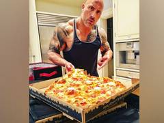 
      
      Cheat meal is like church for The Rock
      
      