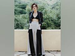 
      
      Taapsee Pannu raises glamour quotient, flaunts toned abs in...
      
      