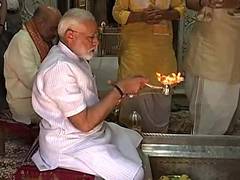 
      
      With prayers and a personal touch, Modi woos Varanasi in...
      
      