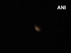 
      
      Partial lunar eclipse graces the sky 
      
      