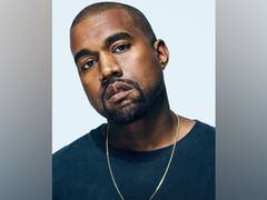 
      
      Kanye West performs at Venice wedding in creepy mask
      
      