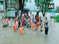 
      
      Locals dance on waterlogged National Highway in Karnataka's...
      
      