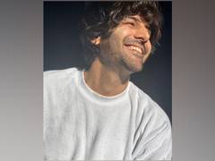 
      
      Kartik Aaryan shares all smiles pic, asks 'What can be more...
      
      