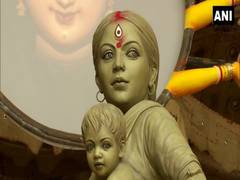 
      
      Walking back miles from big city -- Durga finally home with...
      
      