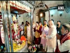 
      
      Amit Shah prays at Dakshineswar Kali Temple, urges people to...
      
      