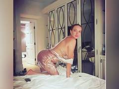
      
      Lindsay Lohan goes semi-topless for a perfect picture pose
      
      