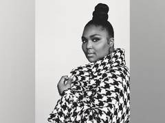 
      
      Lizzo would totally date a Hemsworth but isn't "messing with...
      
      