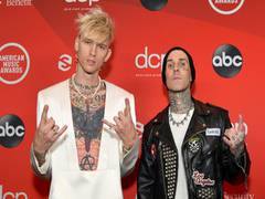 
      
      Machine Gun Kelly, Travis Barker show off matching tattoos in...
      
      