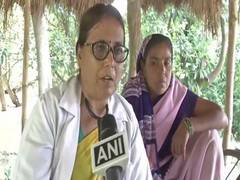 
      
      Bihar: Wading through floodwaters, ASHA worker helps woman...
      
      