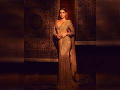 
      
      Kriti Sanon looks drop-dead gorgeous in saree by Falguni 
      
      