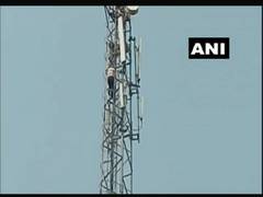 
      
      After quarrel with wife, man climbs mobile tower, persuaded...
      
      