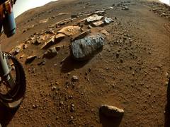
      
      Mars' surface shaped by fast, furious floods from overflowing...
      
      