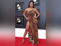 
    Grammys: Megan Thee Stallion stuns in leopard gown on red carpet
    