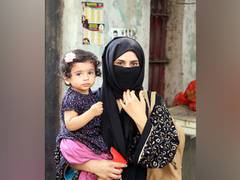 
      
      Fearing persecution back home, Afghan family living in Mumbai...
      
      
