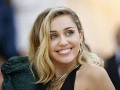 
      
      Miley raves about romance with Simpson, rouses LGBTQ...
      
      