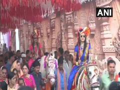 
      
      Two brides ride to their wedding venue in MP
      
      
