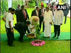 
      
      Modi plants sapling at President's Secretariat in Colombo
      
      