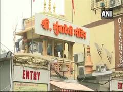 
      
      Devotees pray outside Mumba Devi temple amid pandemic restrictions
      
      