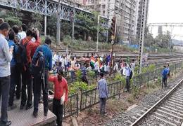 
      
      Members of Bahujan Kranti Morcha block railway track during...
      
      