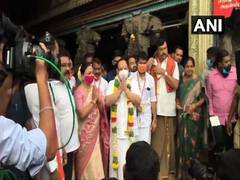 
      
      BJP chief Nadda offers prayers at Madurai's Meenakshi temple 
      
      