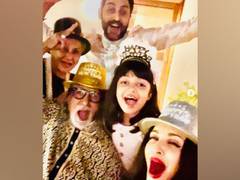 
      
      'Peace, Love and Harmony': Bachchans extend New Year wishes...
      
      