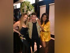 
      
      Mariah Carey says she's 'starting a band' with Nick Jonas,...
      
      