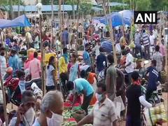 
      
      People crowd local market in Bhubaneshwar's Bapuji Nagar,...
      
      