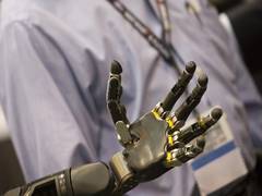 
      
      Researcher develops mind-controlled robotic arm
      
      