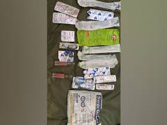 
      
      Pak-made medicines, arms and ammunition recovered from...
      
      